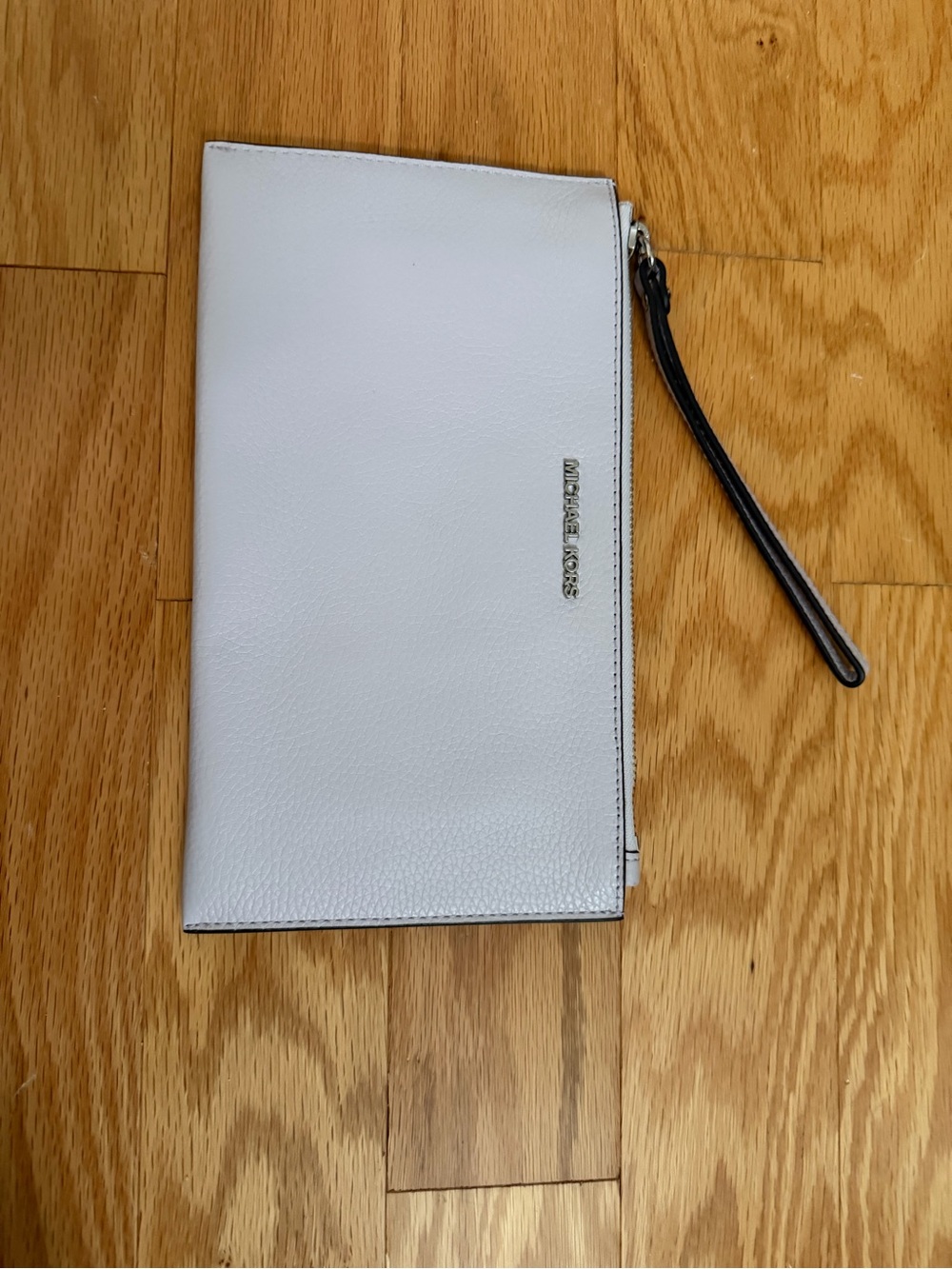 Michael Kors White Leather Wristlet with Black Strap
